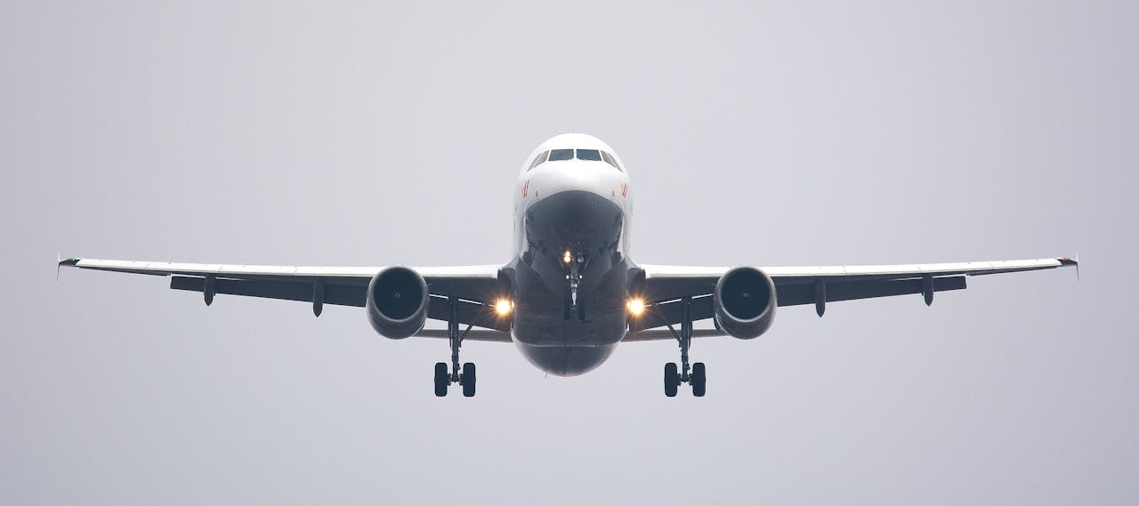 Time Lapse Photography of White Commercial Airplane